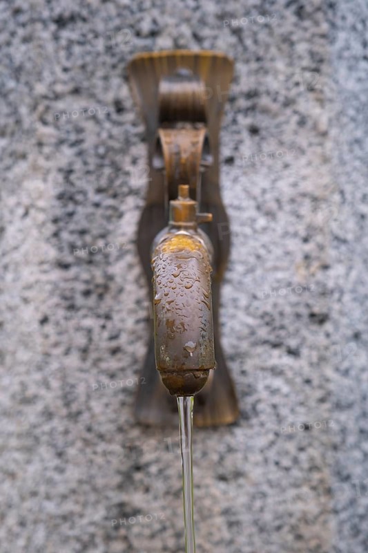 Detailed view of a public fountain, St. Lorenzen, Bolzano, Trentino, South Tyrol, Italy