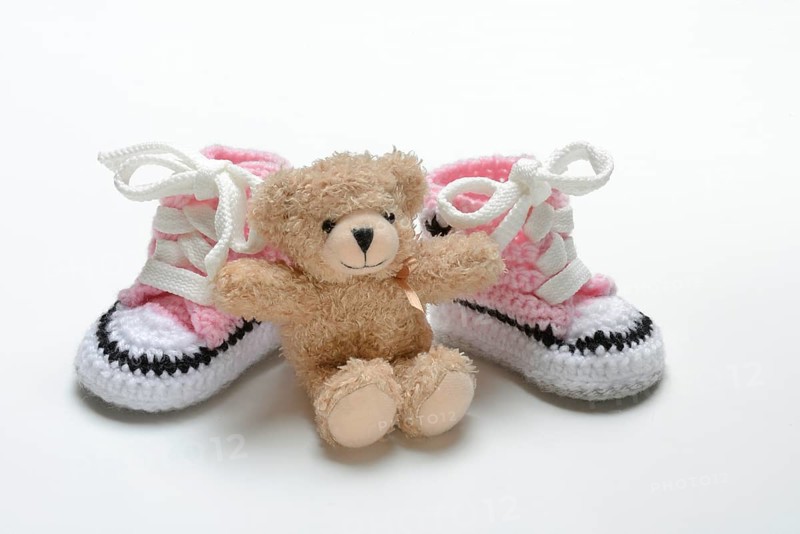 Pink baby shoes with teddy bear