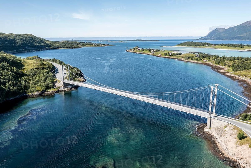 Aerial view of bridge over Straumsbotn fjord, Straumsnes peninsula in the back, RV 86 east of village Hamn i Senja, Senja island, Norway