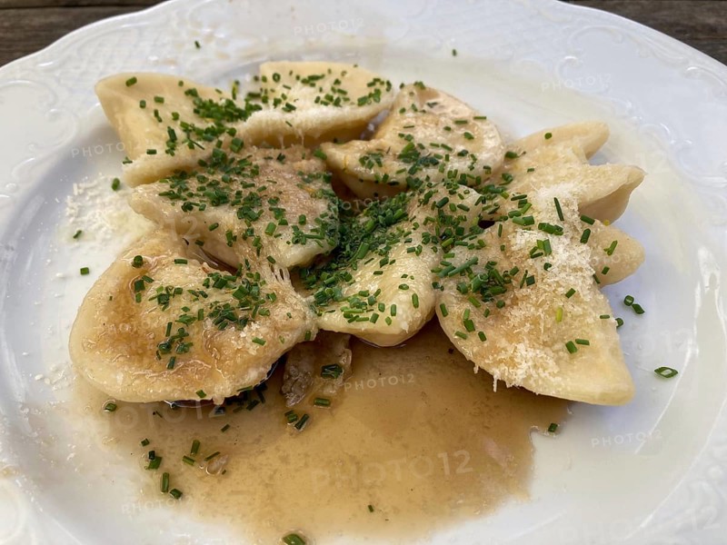 Delicious Schlutzkrapfen or Schlipfkrapfen, traditional dish in East Tyrol, Austria