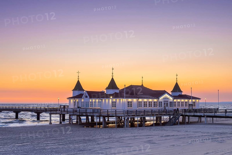 Restaurant on Ahlbeck Pier, Seebrücke Ahlbeck in the Baltic Sea at sunrise on Usedom island, Mecklenburg-Vorpommern, oldest pier in Germany