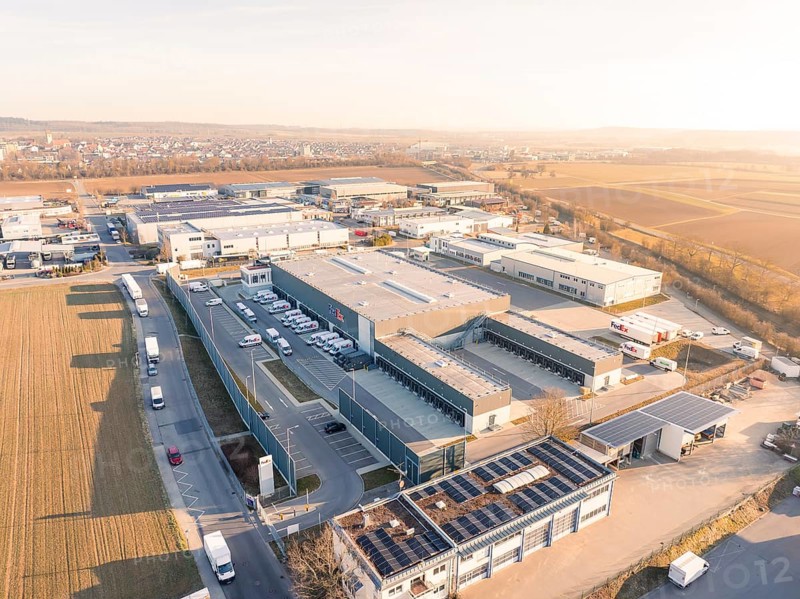 Aerial view of industrial facilities with roads and surrounding rural area, Fedex, Nufringen, Germany