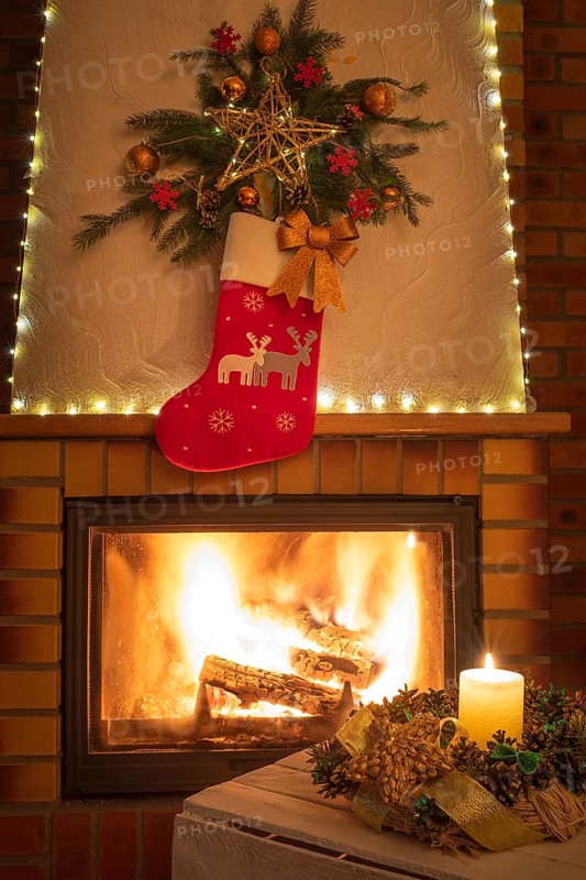 Christmas floral decoration in front of firepace