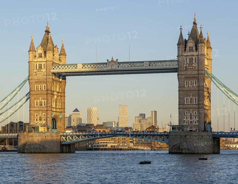 Tower Bridge in sunshine at dusk, River Thames from Southwark, London, England, UK
