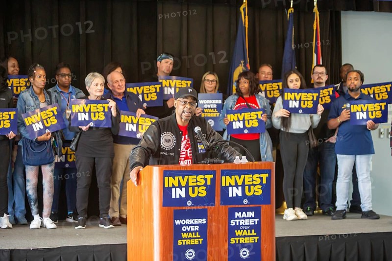 Warren, Michigan USA - 6 May 2025 - Members of the United Auto Workers who work at Stellantis rally, demanding that the company bring auto jobs back to Michigan. UAW leaders note that Stellantis has substantial excess capacity at its American plants. UAW Local 1700 President Mike Spencer speaks at the rally