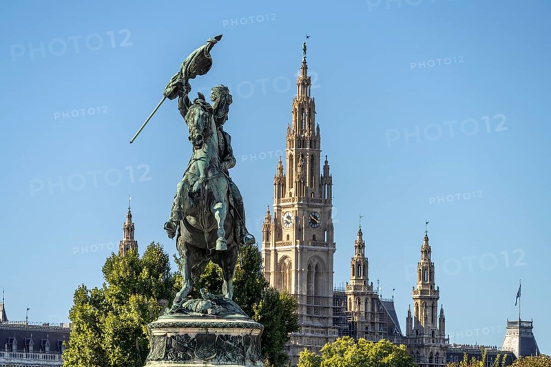 The equestrian statue of Archduke Karl on Heldenplatz and the City Hall in Vienna, Austria