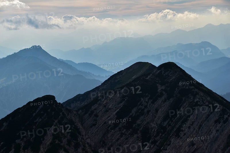 View from the summit of the Sonntagshorn, highest mountain in the Chiemgau Alps, towards the Reifelberge, Salzburger Land, Austria