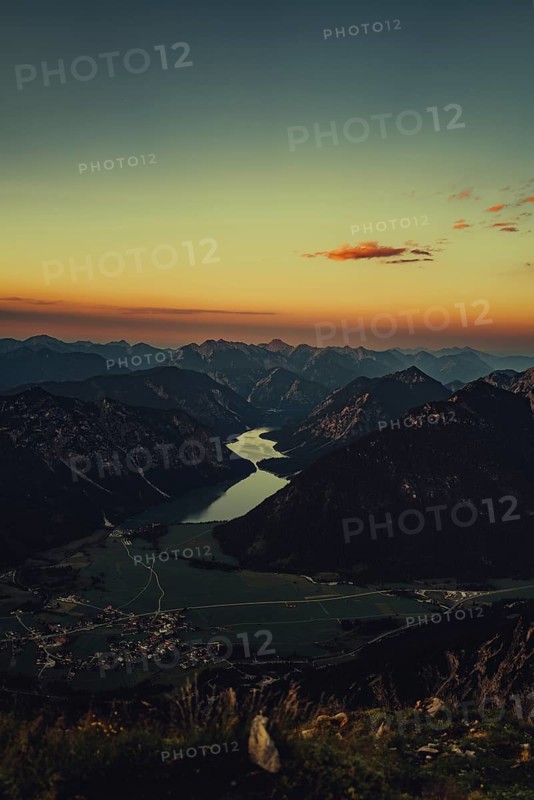 Thaneller summit at sunset in the Lechtal valley in Tyrol with a wonderful view of the surrounding mountains. Tyrol, Austria