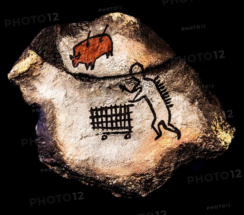 Banksy - Wall Art - East London, ironic quote on the cave paintings of Lascaux, where people venture into hunting grounds outside the city, exhibition The World of Banksy