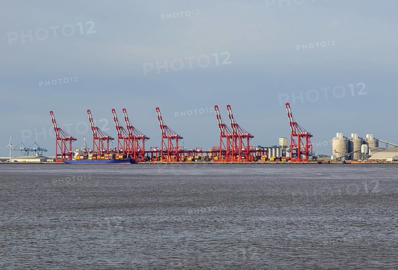 Port Of Liverpool gantry cranes at Seaforth Dock container terminal, Liverpool, Merseyside, England, UK from Wallasey