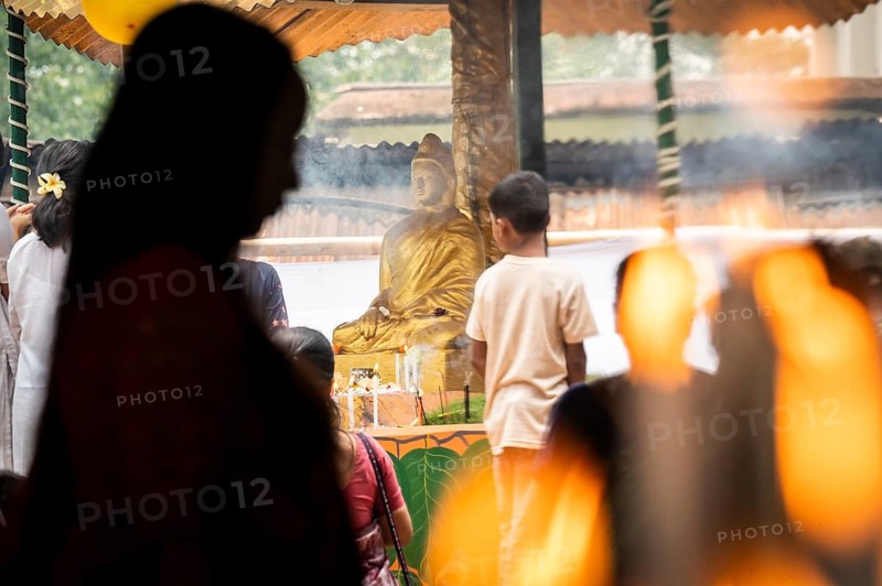 Devotees pray to Lord Buddha on the occasion of Buddha Purnima or Vesak Day that commemorates Gautam Buddha's birth anniversary, at a monastery in Assam, India on 12 May 2025