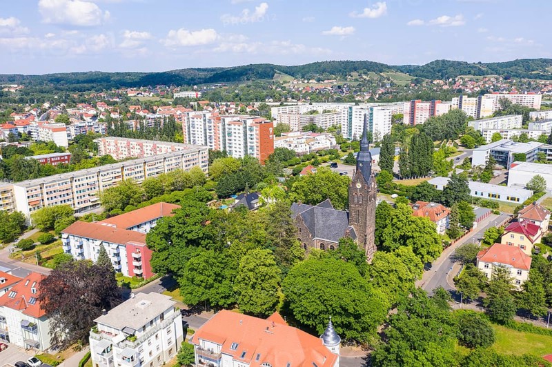 Aerial view of the New Church, in the background the grammar school and the new development area Dresdner Straße, Coswig, Saxony, Germany