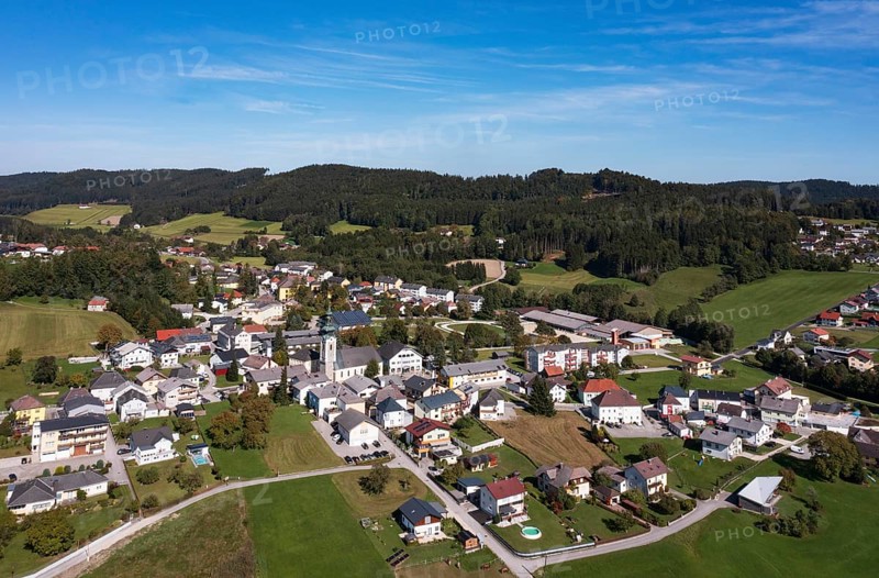 Drone image, view of the village with parish church, Ampflwang im Hausruckwald, Hausruckviertel, Upper Austria, Austria