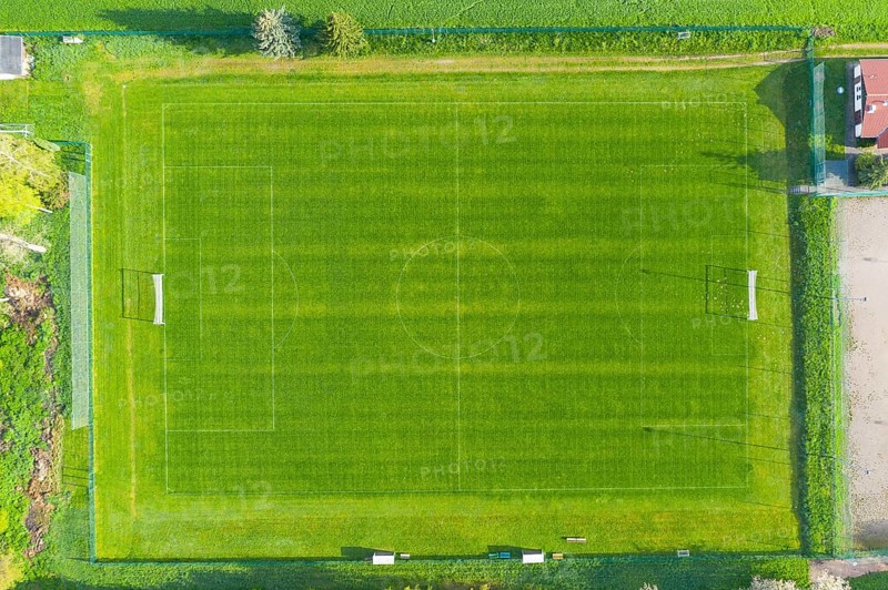 Pleasure painting of the pattern of a small football field surrounded by field, Kriebstein, Saxony, Germany