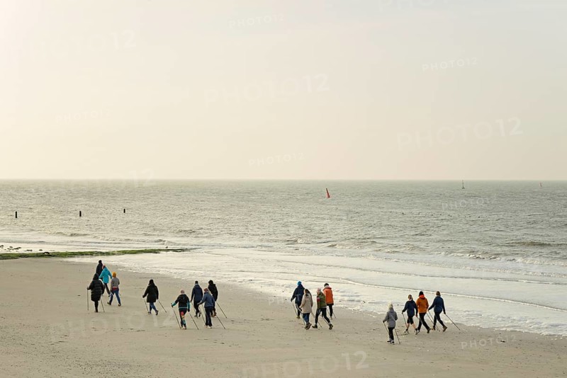 Sports group Nordic walking on the beach, North Sea, Norderney, East Frisian Islands, Lower Saxony, Germany