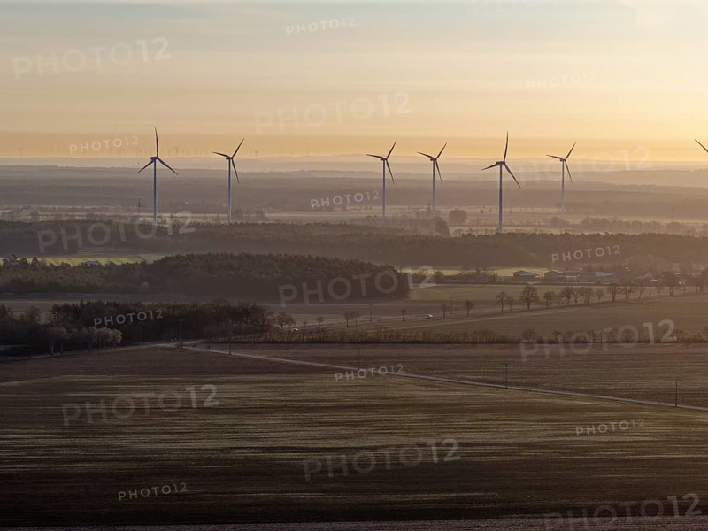 Wind turbines in the Drömling UNESCO Biosphere Reserve in the Altmark early in the morning on a cold spring day. aerial view. Dannenfeld, Gardelegen, Saxony-Anhalt, Germany
