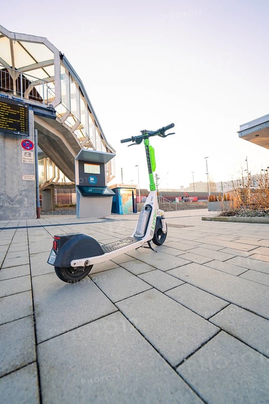 E-scooter on paving stones in front of modern urban architecture in bright daylight, Sindelfingen, Böblingen district, Germany