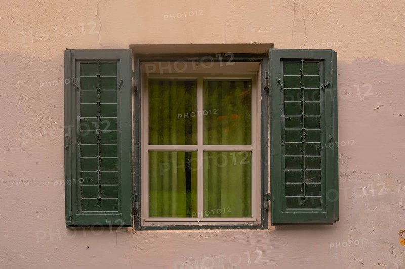 View of a window of a house in a mountain village, St.Peter, Villnöß, Funes, Villnößtal, South Tyrol, Italy