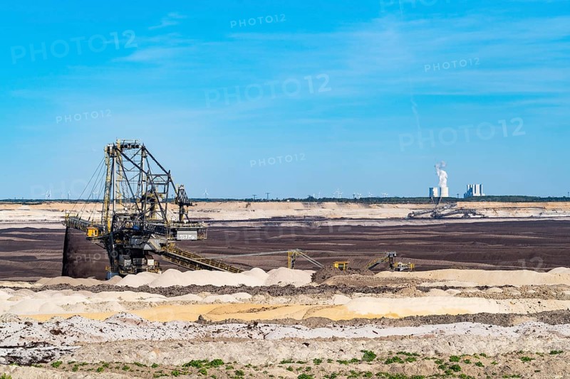 Stacker in the Welzow-Süd opencast lignite mine, Schwarze Pumpe power station in the background, Niederlausitz, Spree-Neiße, Brandenburg, Germany
