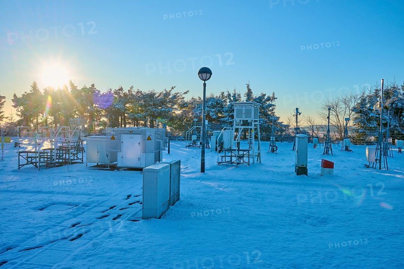 Weather station with snow-covered facilities at sunrise, winter, Wasserkuppe, Gersfeld, Rhön, Hesse, Germany