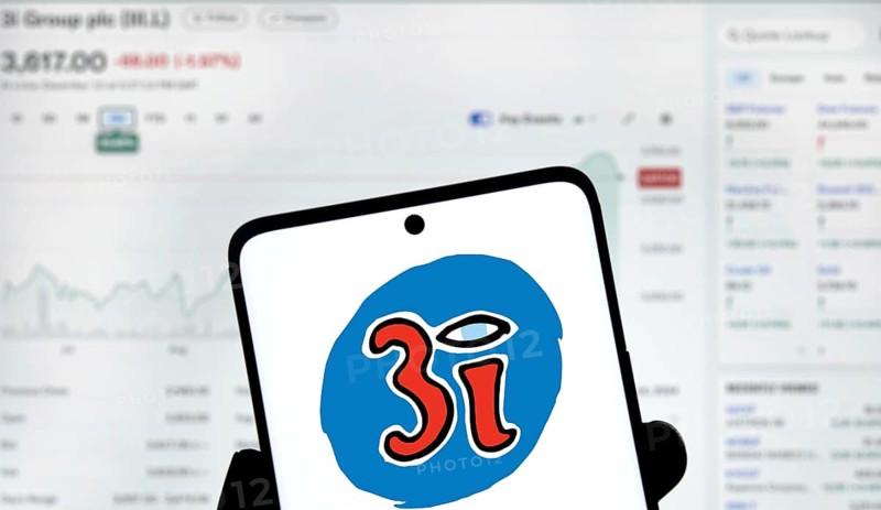 3i logo is displayed on smartphone. 3i Group plc is a British multinational private equity and venture capital company.