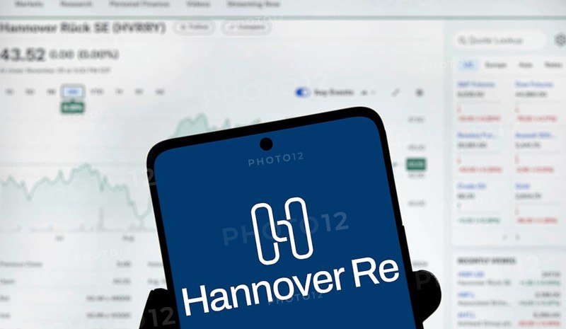 Hannover re logo is displayed on smartphone.Hannover Re is a reinsurance company