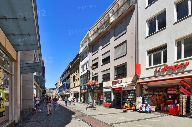 Kaiserslautern, Germany, August 2022: Shopping street called 'Fackelstrasse' with people in city center