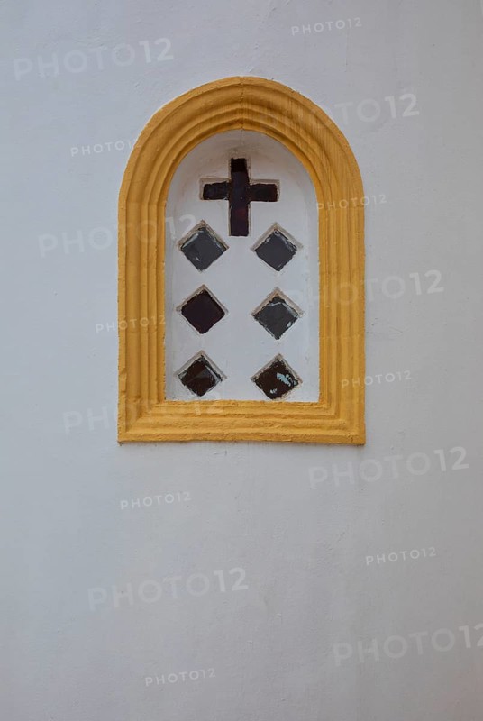 Mountain village Lakkoi with Agios Antonios church, church window, Crete, Greece