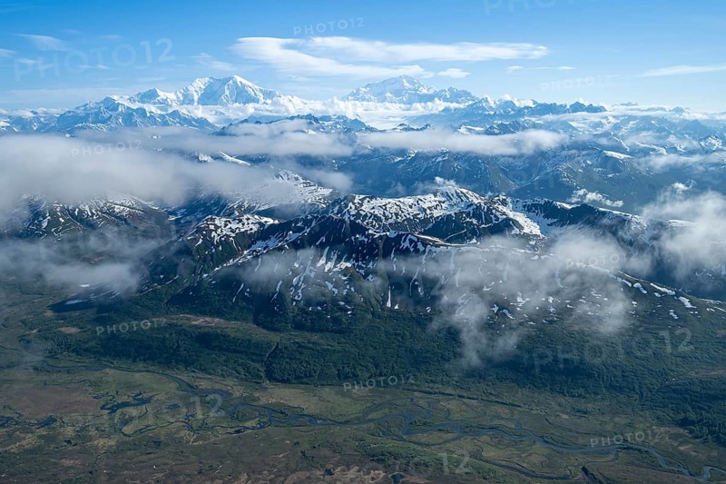 Clouds over high mountains, Mt Foraker and Mt Denali or Mount McKinley, aerial view, Alaska Range, Denali National Park, Alaska, USA