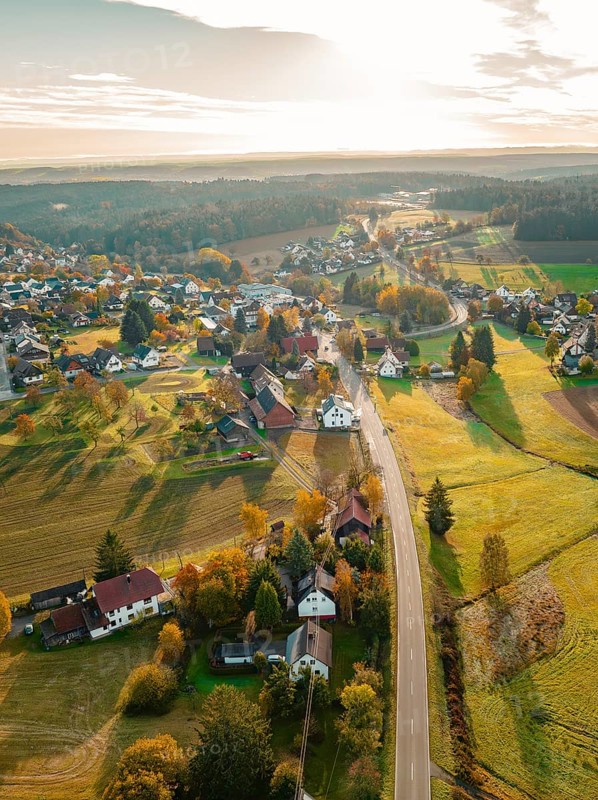 Aerial view of small village in evening sun, Oberreichenbach, Black Forest, Germany