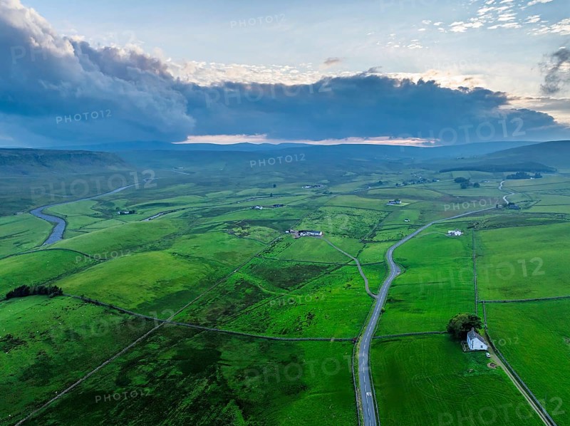 Forest in Teesdale over River Tees from a drone, North Pennines AONB, County Durham, England, United Kingdom