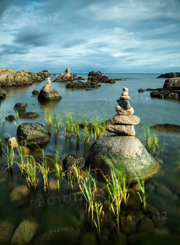 Rocky coast with cairns, Allinge-Sandvig, Bornholm, Denmark