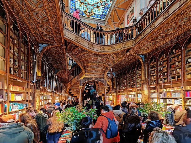 Livraria Lello, interior view of the Lello bookstore with lots of tourists, Overtourism, Porto, Portugal