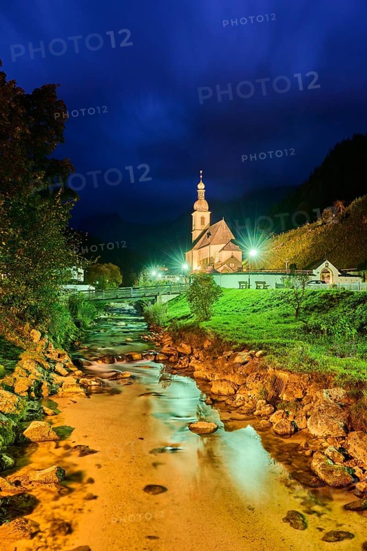 Church St. Sebastian in Ramsau at night, Ramsauer Ache River, autumn, Idyllic village, Berchtesgadener Land, Bavaria, Germany