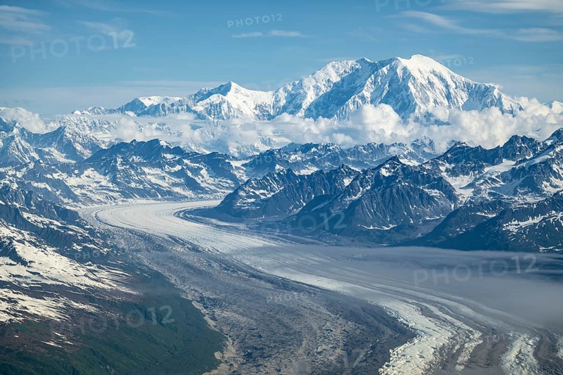 Clouds over high mountains, Mt Foraker with Kahlitna Glacier, aerial view, Alaska Range, Denali National Park, Alaska, USA