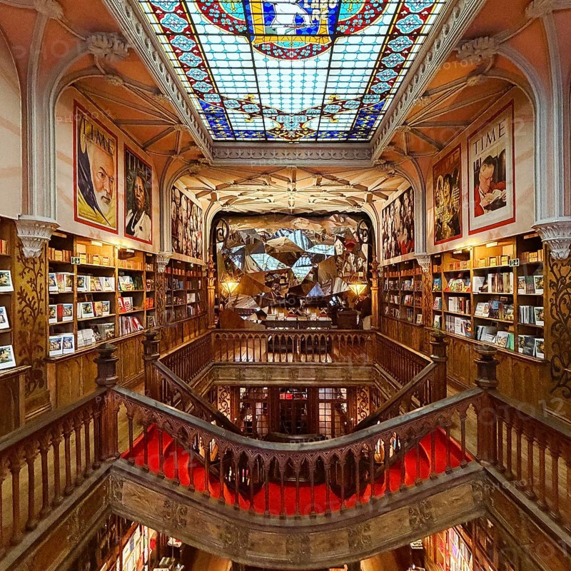 Livraria Lello, interior of the Lello bookstore on the upper floor with the magnificent ceiling glass window by Samuel Van Krieken, Porto, Portugal