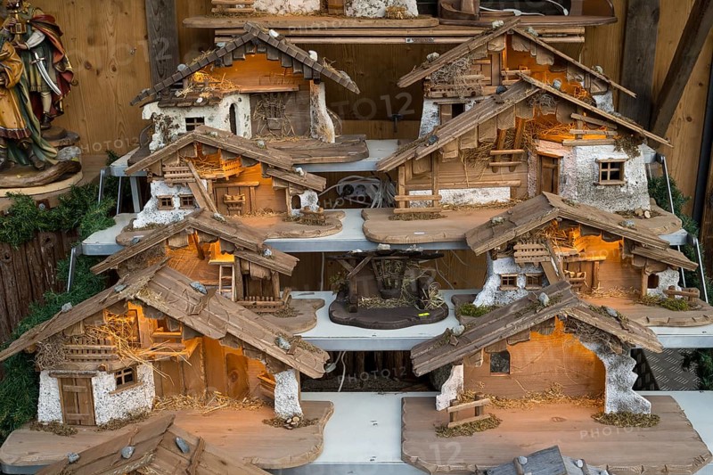 Christmas cribs at a Christmas market stand, several cribs, farmhouse modeled on, traditional, North Rhine-Westphalia, Germany