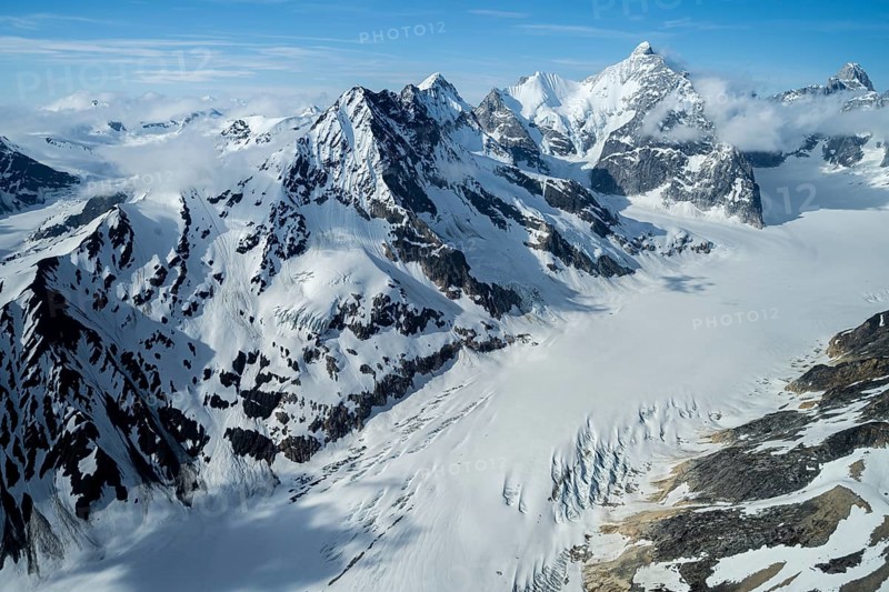 Snow and ice, epic mountains with glaciers, aerial view, Alaska Range, Denali National Park, Alaska, USA