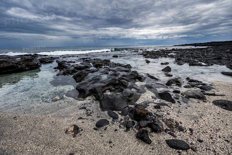 Sandy and rocky coast with volcanic stones, Playa de la Pequeña, Punta Usaje, Lanzarote, Canary Islands, Spain