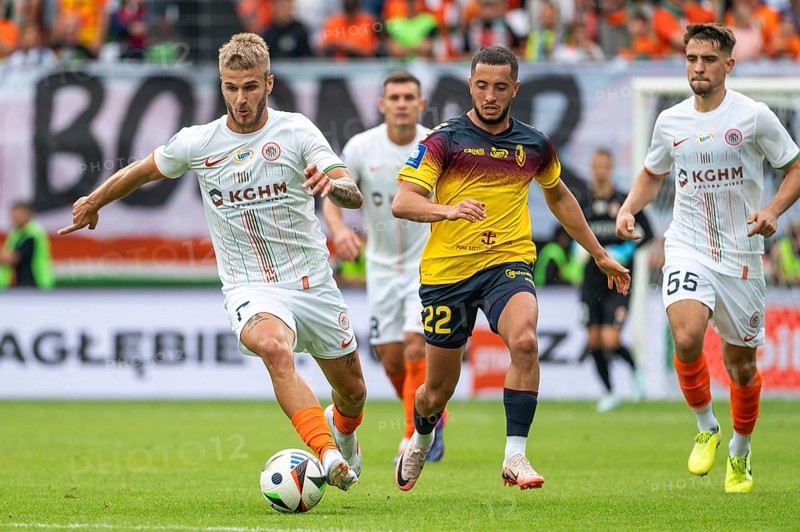 LUBIN, POLAND - JULY 28, 2024: Football match Polish PKO Ekstraklasa between KGHM Zaglebie Lubin vs Pogon Szczecin. Marek Mroz (L) Vahan Bichakhchyan (R).