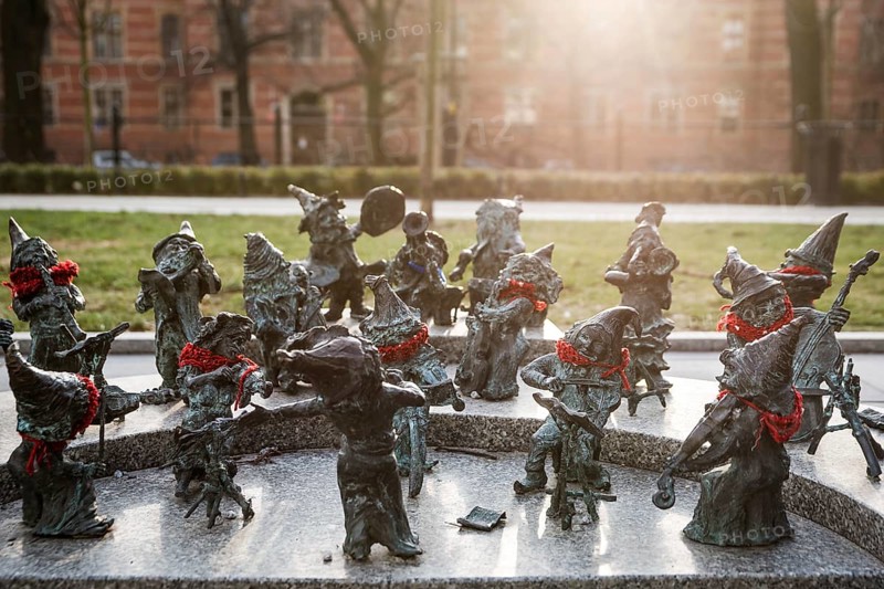 WROCLAW, POLAND - JANUARY 19, 2019: Statue of dwarves representing philarmonic orchestra of Poland located in front of the building National Forum of Music.