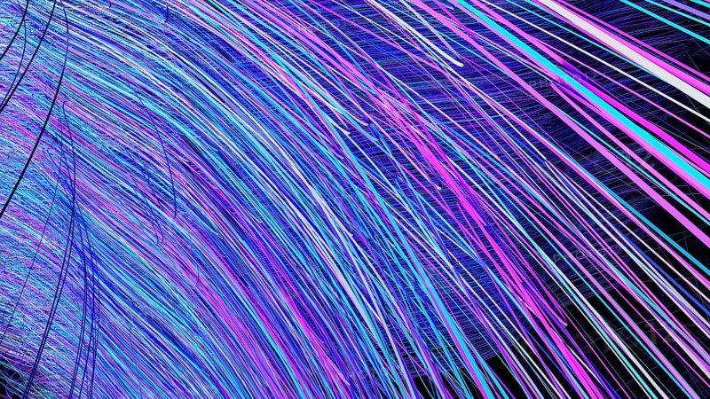 Swirling lines in varied colors create a stimulating abstract background reflecting modern technology concepts and innovation