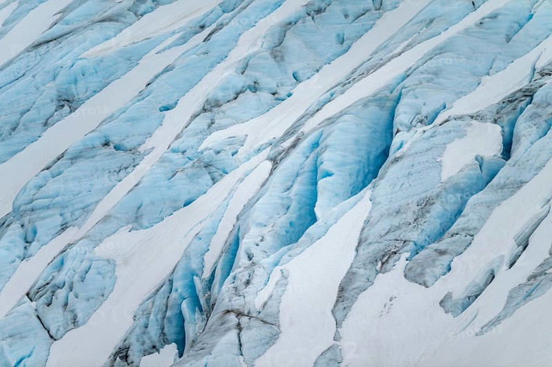 Blue rugged glacier ice with crevasses and snow, detail, Exit Glacier, Kenai Peninsula, Alaska, USA
