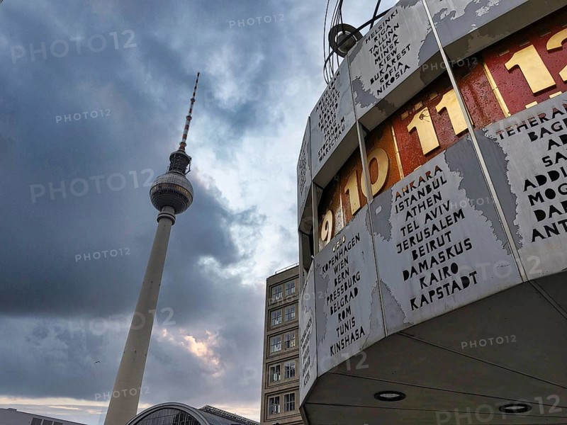 Berlin TV Tower and Berlin World Time Clock under cloudy sky at dusk, Alexanderplatz, Alex, Mitte, Berlin