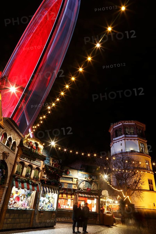 Christmas market with a ferris wheel on Burgplatz square, historic town centre, Dusseldorf, North Rhine-Westphalia, Germany