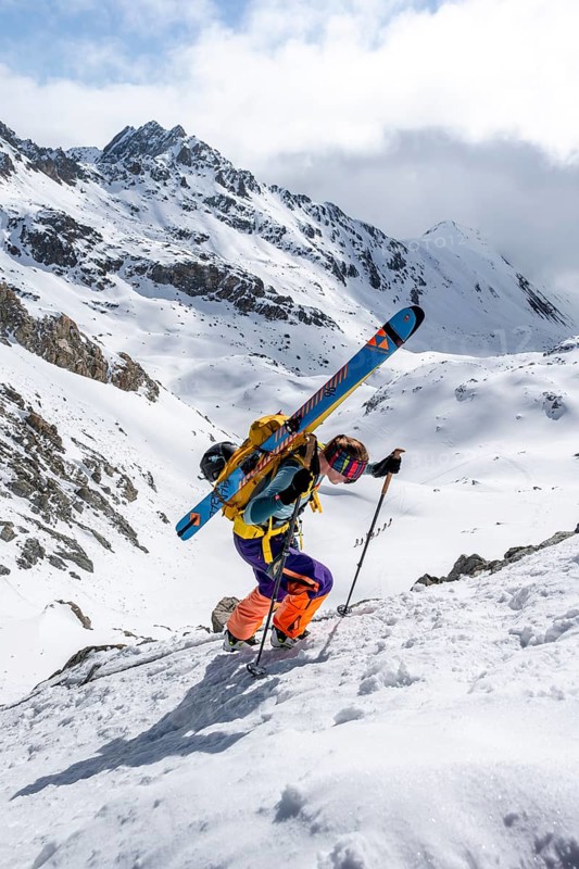 Mountaineer with skis at the fork Porta d'Es-cha, ski tour Bündner Haute Route, Albula Alps, Rhaetian Alps, Grisons, Eastern Switzerland, Switzerland
