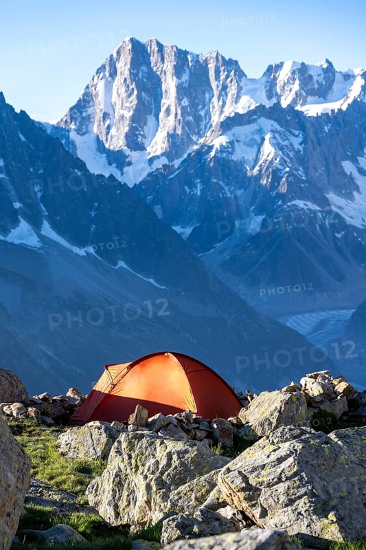 Red tent in front of a mountain panorama, mountain landscape in the morning light, mountain peak Grandes Jorasses, Mont Blanc massif, Aiguilles Rouges, Chamonix-Mont-Blanc, Haute-Savoie, France