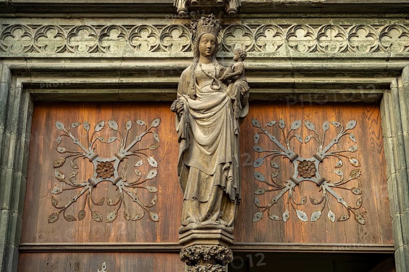 Statue of Mary on the south portal of the church of St. Maria zur Wiese or Wiesenkirche in Soest, North Rhine-Westphalia, Germany