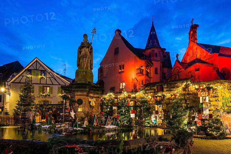 Houses illuminated and decorated for Christmas, Christmas market, blue hour, Eguisheim, Haut-Rhin department, Grand Est region, Alsace, France