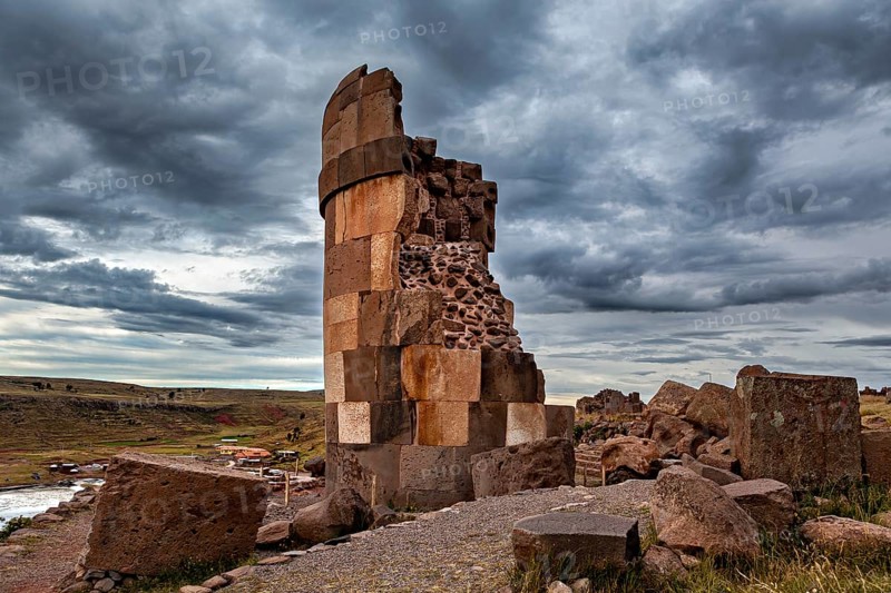 A partially preserved stone tower in an abandoned area, The Chullpas of Sillustani near Puno in Peru